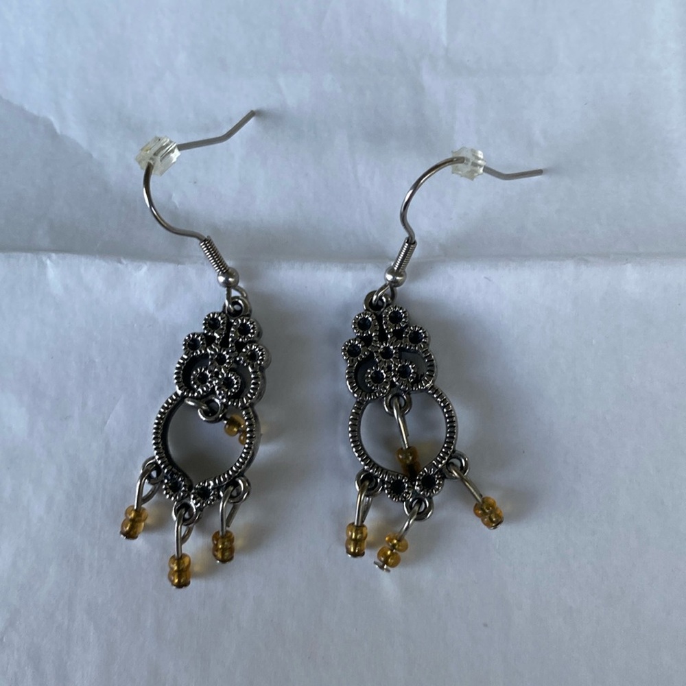 Beautiful detailed silver long earrings with yellow/gold beads